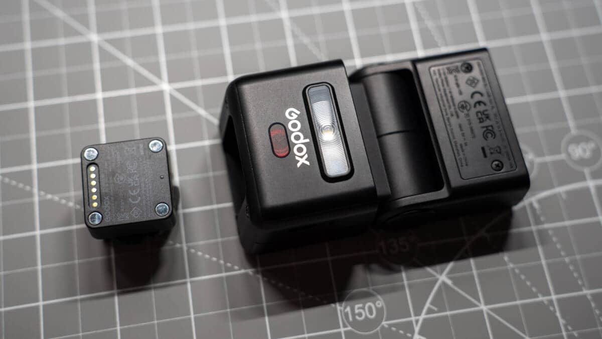 Godox iT32 speedlight separated from the compact X5 hot-shoe transmitter module