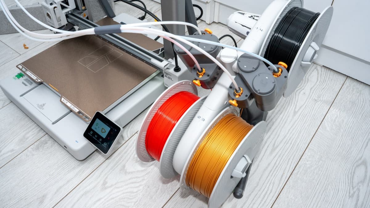 Four PTFE filament feed lines routed into the toolhead 4-in-1 multiplexer