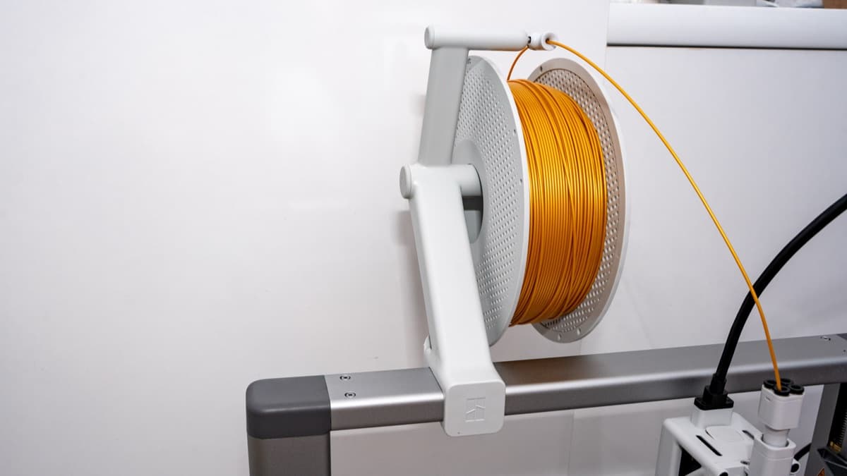 Rear clearance and robust wiring loom extending during full Y-axis bed motion