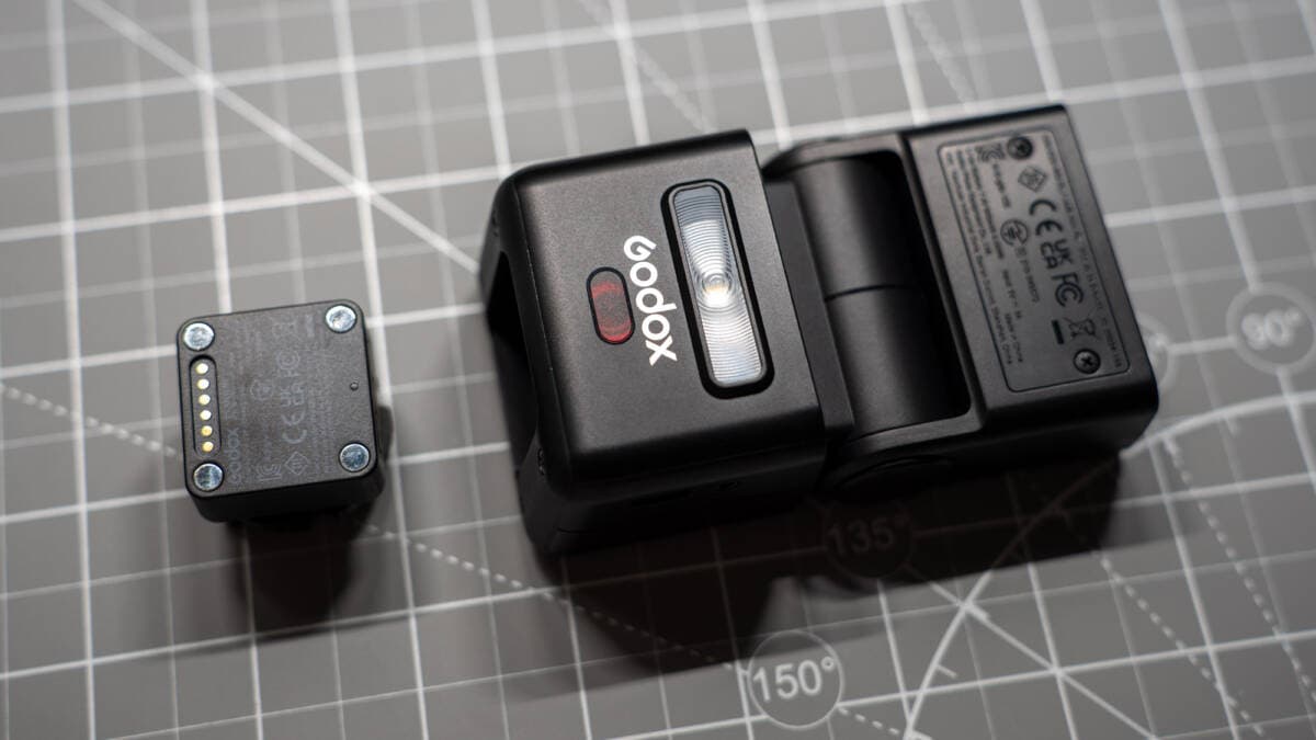 Godox iT32 speedlight separated from the compact X5 hot-shoe transmitter module