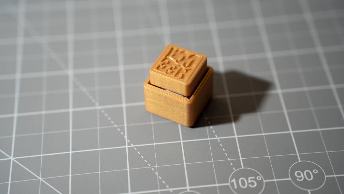 Off-camera flash positioned on desktop stand for creative tabletop lighting