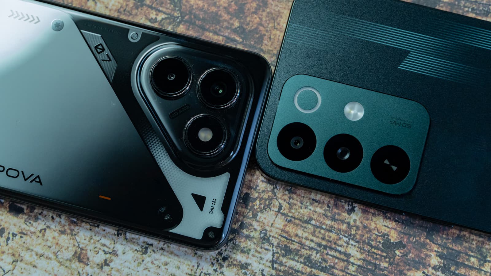 Rear camera housings: realme 50MP module with halo light vs. TECNO 108MP matrix — Photo: Sergey Kuznetsov