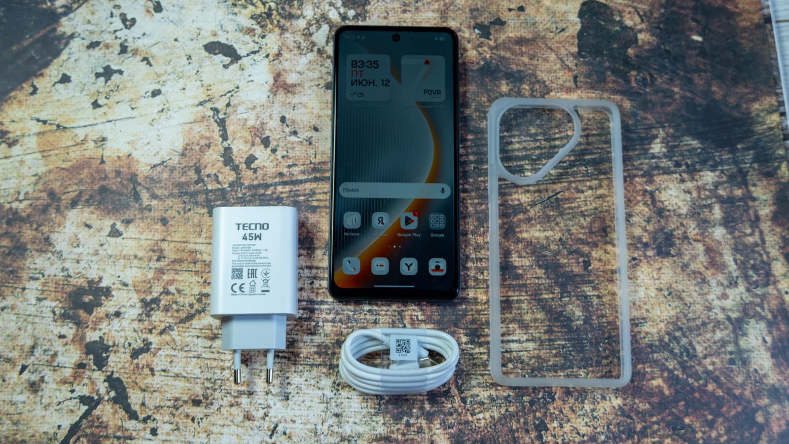 Included 45W fast chargers and cables inside both retail bundles — Photo: Sergey Kuznetsov