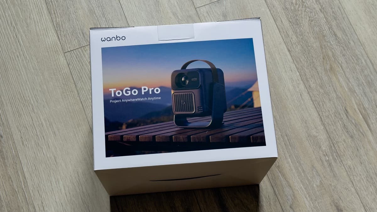 Wanbo ToGo Pro retail packaging featuring full-color lifestyle photography and key feature highlights
