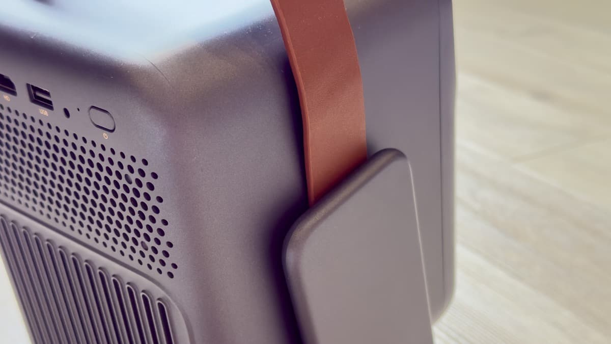 Rear acoustic ventilation grille detailing low-noise cooling exhaust and internal acoustic damping chamber